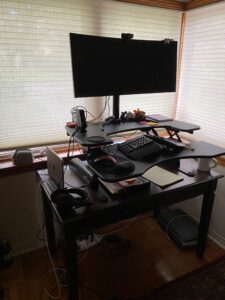 Image of stand up desk with ultra wide monitor
